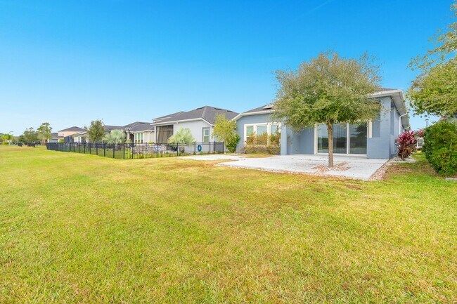 Building Photo - Luxurious Solar Powered 4 Bedroom, 3 Bath Waterfront Home with office & Upgrades Galore!