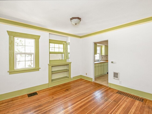 Building Photo - Adorable, vintage 1924 2-bdrm/1-bath w/ fenced yard, raised beds, & chicken house—Great location ...