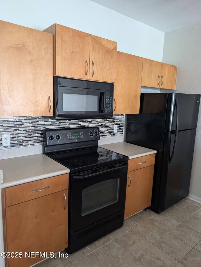 Building Photo - 8290 Gate Parkway West Unit 519