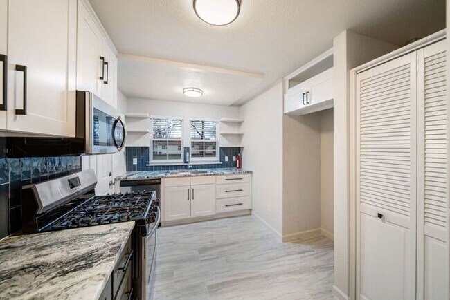 Building Photo - Move In SPECIAL! Beautifully Remodeled 2-B...