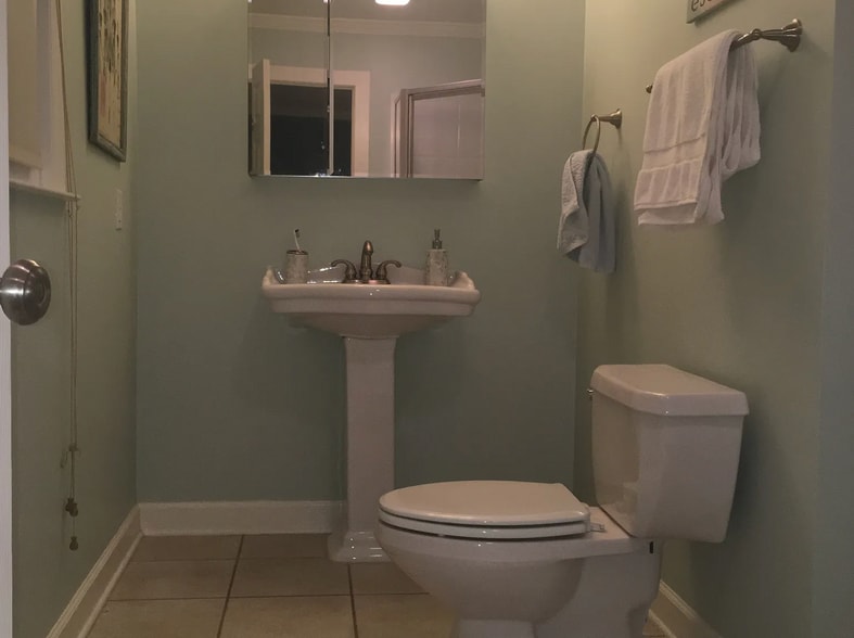 **now painted white, black tile floors - 1104 Linden Rd