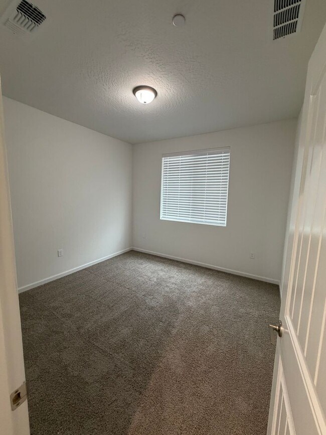 Building Photo - Spacious Brand New 4-Bedroom, 3-Bathroom Home with Solar & Low-Maintenance Yard