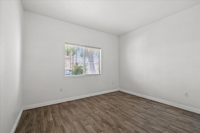 Building Photo - Charming 2-Bedroom First Floor Featuring Open Layout, Fireplace, Patio & Community Pool