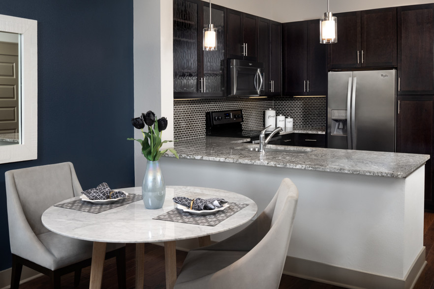 Gourmet kitchens feature granite or quartz finishes - Strata Apartments