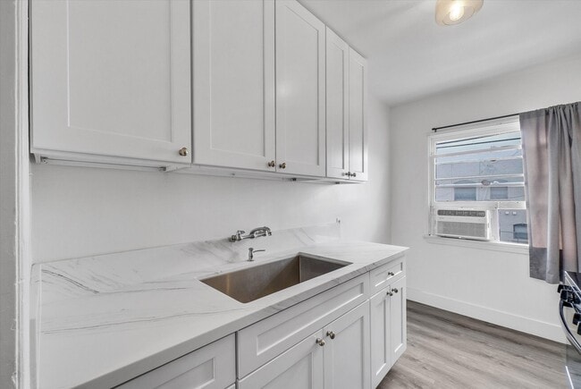 New cabinet, granite countertop, and stainless steel deep sink - 122 Elm Ave