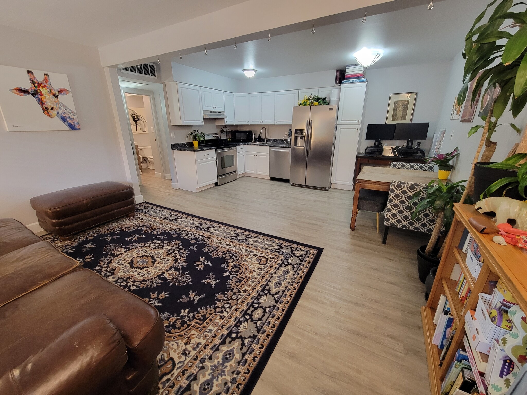 Before the remodel to see the space furnished - 3663 S Sheridan Blvd