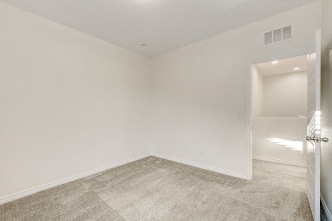 Building Photo - 4 Bedroom Townhouse in Tule Springs Coming Soon!