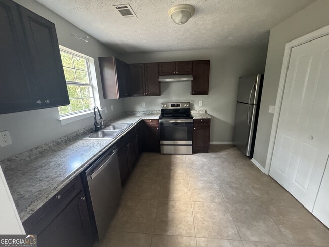 Building Photo - 10226 Stone St NW