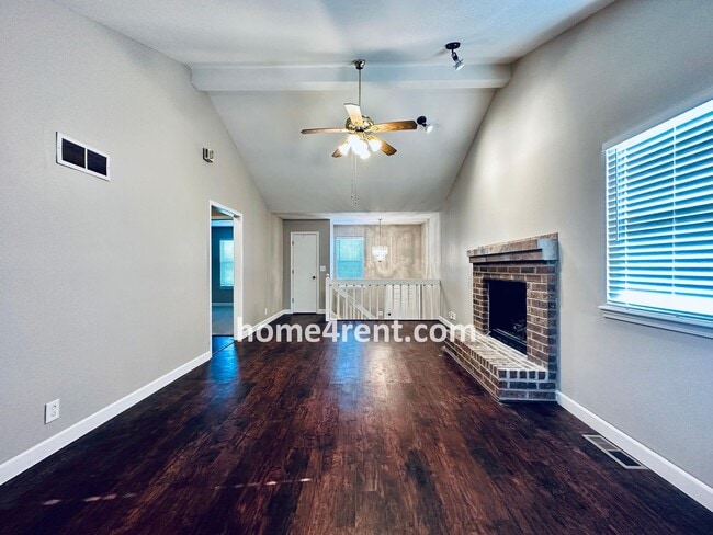 Building Photo - Updated Kitchen, Composite Deck and Refrig...