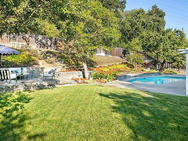 Building Photo - Stunning 4BD + Office Home with Pool in Li...