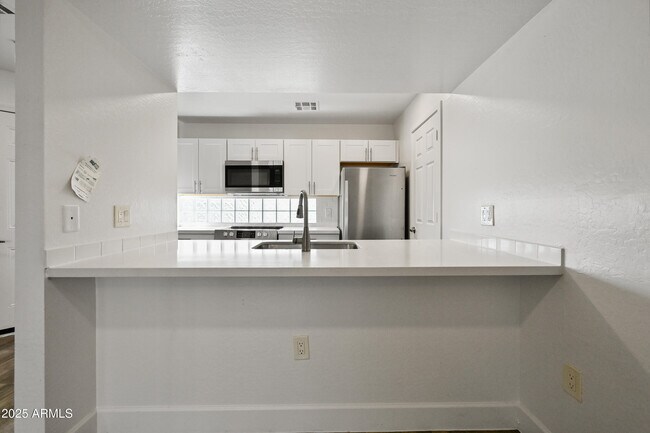 Building Photo - 3065 N 67th Ave