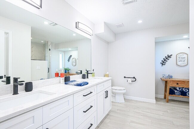 Building Photo - Waterfront Furnished Pool Home with Gulf & Canal Views in Estero Bay Shores