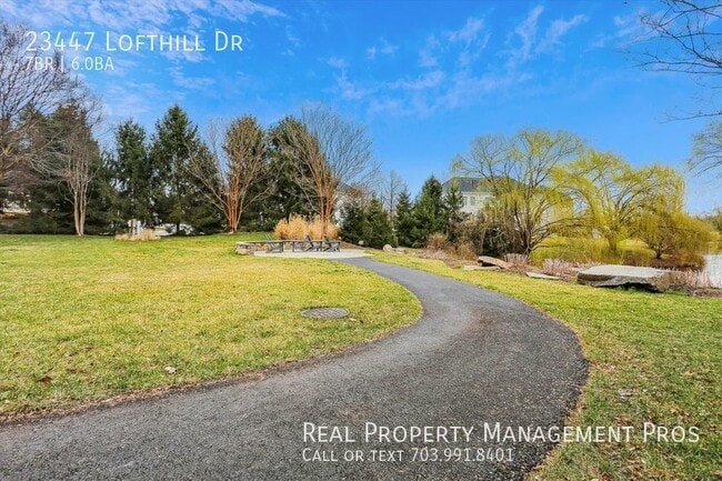 Building Photo - Beautifully Maintained 7 Bedroom 6 Bath Ho...