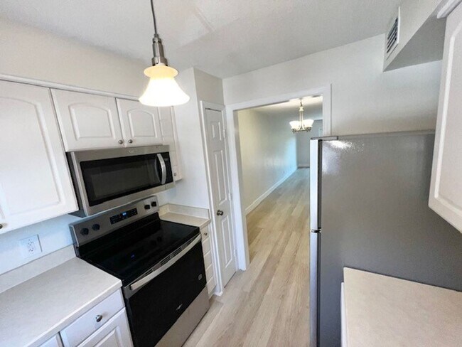 Building Photo - 2X2.5 -MOVE IN NOW! NEW LVP FLOORING ON 1ST FLOOR! NEW CARPET ON 2ND FLOOR! WATER VIEWS! CALL TOD...