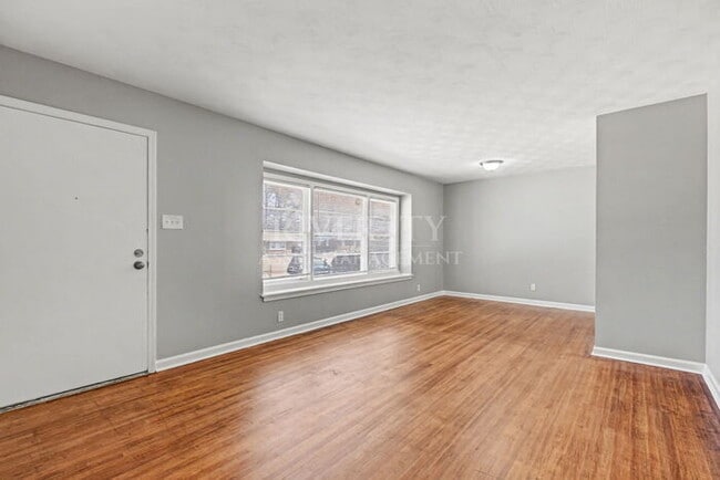 Building Photo - A MUST SEE LOCATED IN A BEAUTIFUL PART OF THE CITY!!!!!! SECTION 8 WELCOMED!!