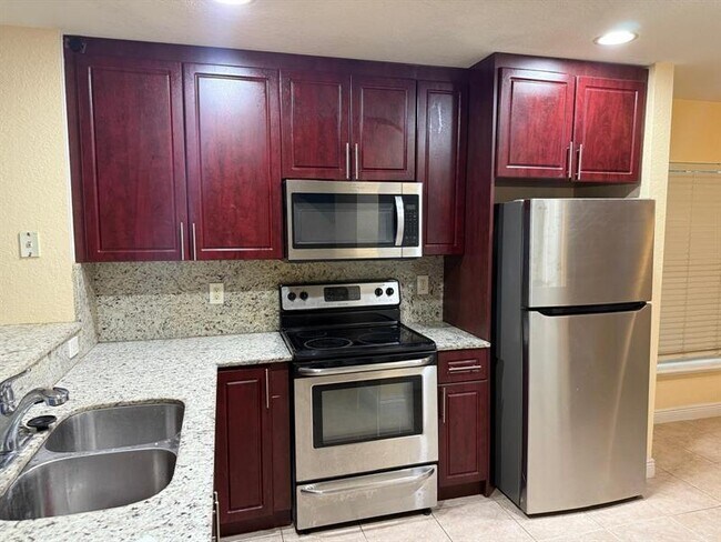 Building Photo - 9981 SW 26th Ct