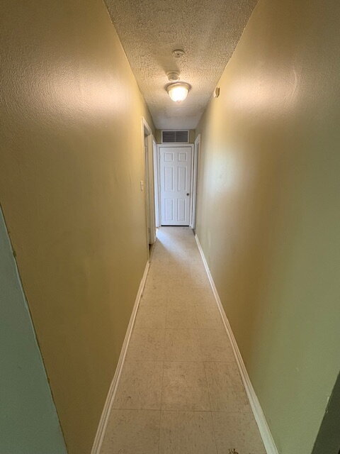 Building Photo - Beautiful hardwood floors and new appliances!