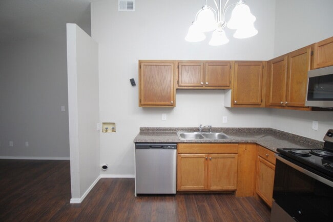 Building Photo - Ready Now Updated Two Bedroom Apartment with Wood Look Flooring and New Appliances & ½ OFF FIRST ...