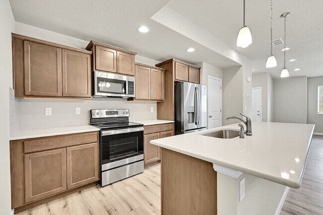 Building Photo - $2,040.95 -  3 bed, 2.5 bath Townhome in CO Springs with Central AC!