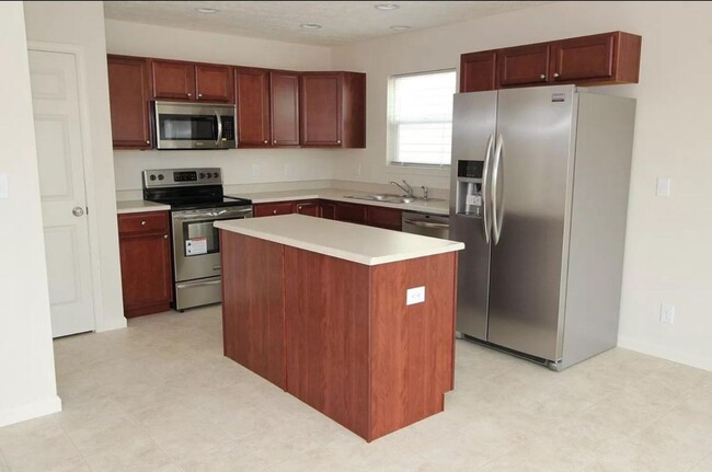 Building Photo - LINDBERG VILLAGE...3 Bedroom 2 Bath House