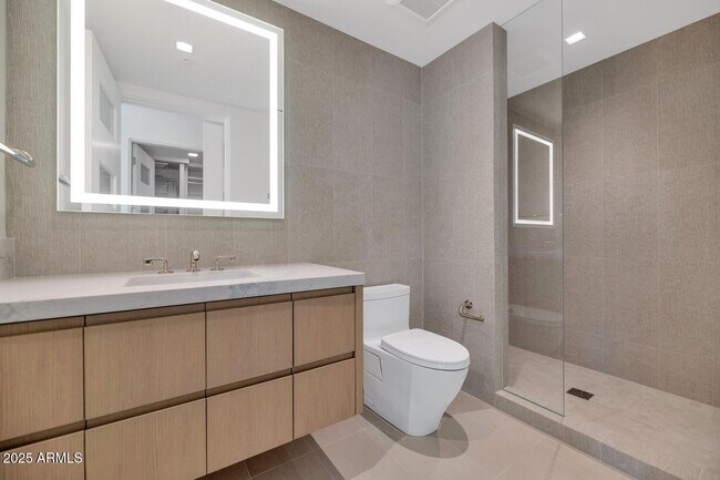 Building Photo - 6587 N Palmeraie Blvd