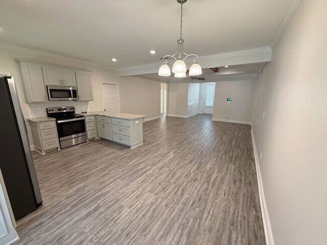 Building Photo - Stylish 4-Bedroom Home with Screened Porch...