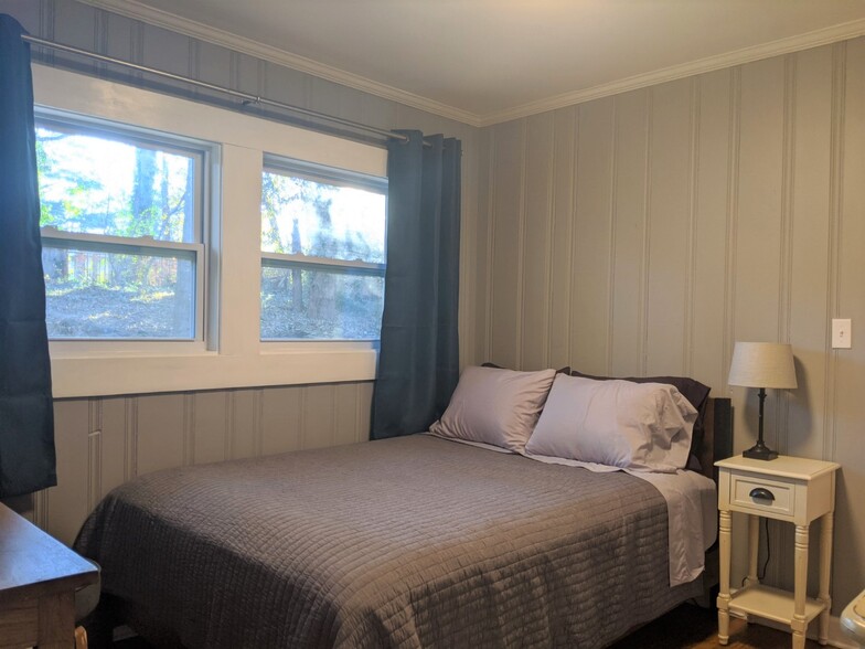 NOTE - This bedroom/office is provided unfurnished except for the chest of drawers and mirror. - 2156 Barbara Ln