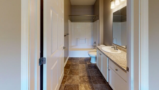 Building Photo - Second Floor Front Facing 2 Bedroom in a Gated Community!