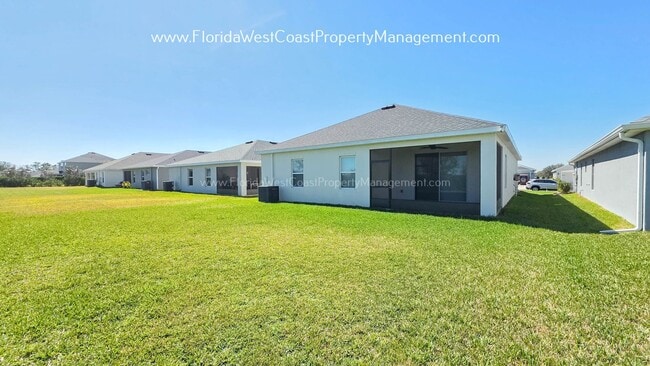 Building Photo - BRILLIANT 4 BEDROOM/2.5 BATH HOME AVAILABLE IN AVIARY at RUTLAND RANCH PARRISH!