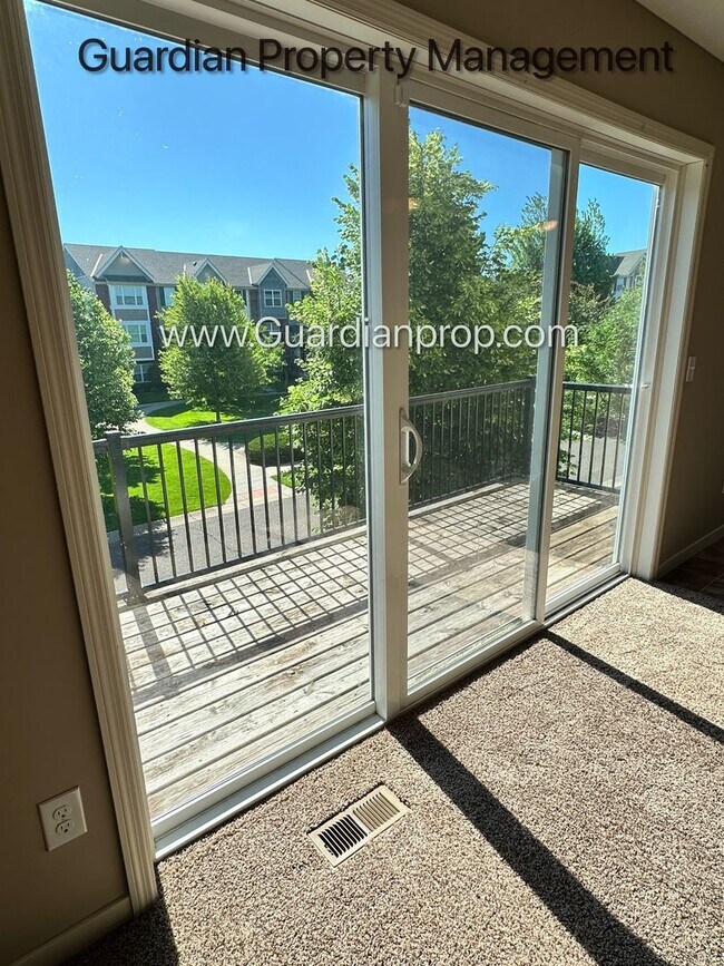 Building Photo - Champlin Corner Unit Town Home, 2 Car Garage, Dishwasher, Washer/Dryer, Balcony