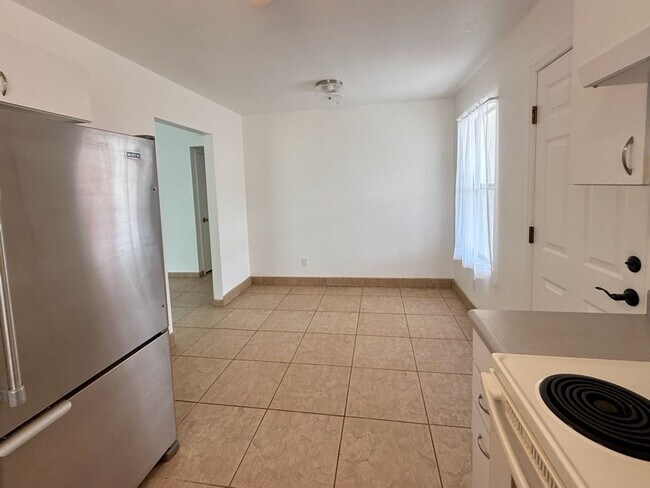 Building Photo - Charming three bedroom - two bathroom GREA...
