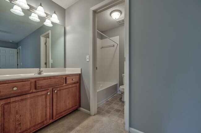 2nd bedroom bath with shower over tub - 22613 W 72nd Ter