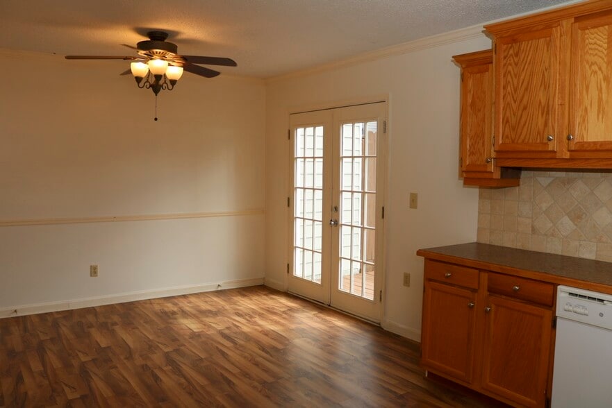 Sunny french doors leading to private deck. - 7005 Sand Wedge Cir