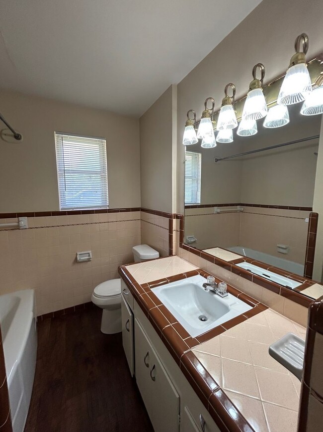 Building Photo - Beautiful Corner Lot Living