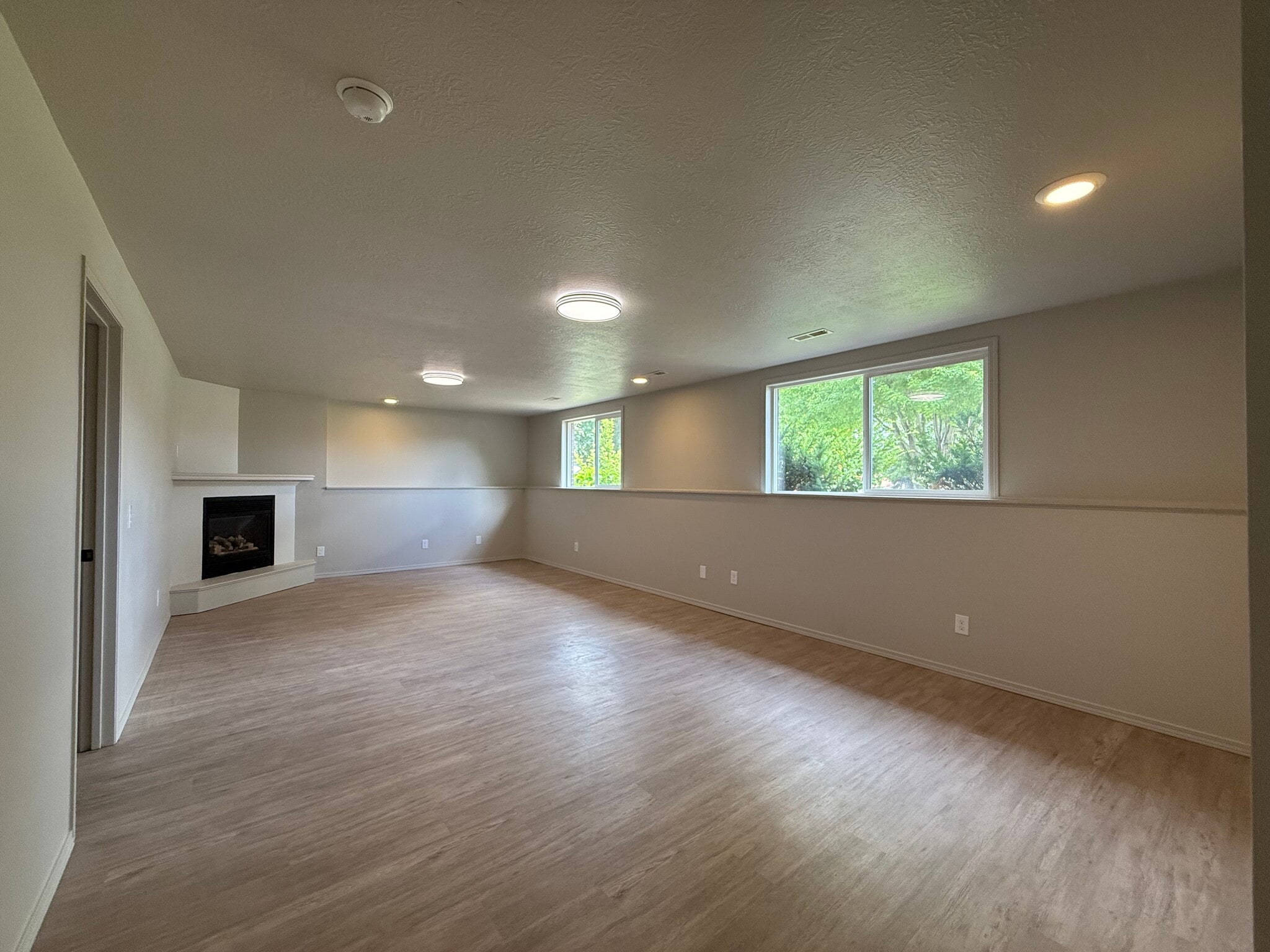 Downstairs living room with gas fireplace - 2005 S Gordon Dr