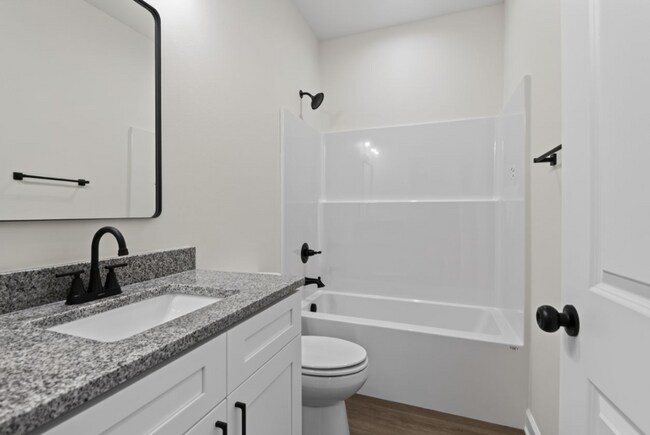 Building Photo - Inviting Home with Bright Interiors & Ceiling Fans Throughout - Comfortable Rental with Everyday ...