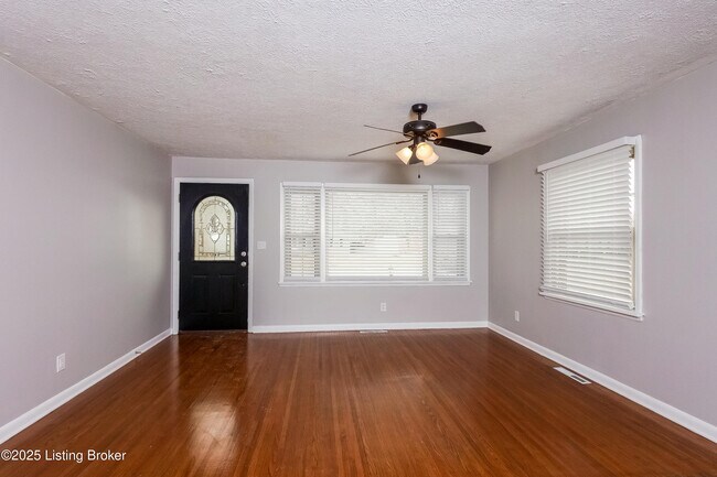 Building Photo - 7706 Poinsettia Dr