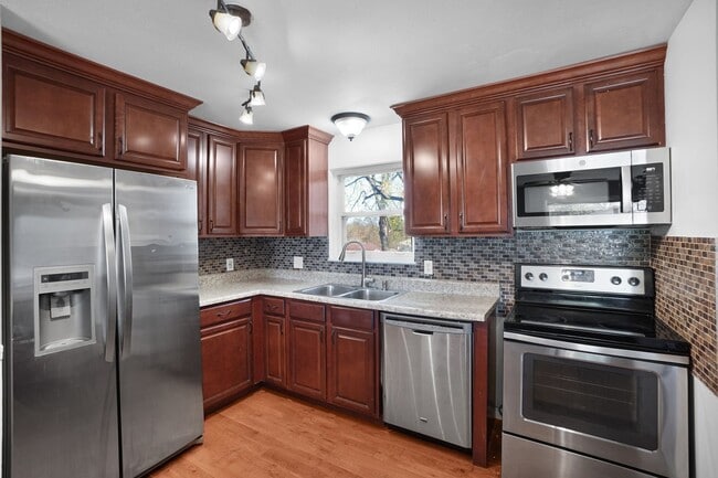 Building Photo - Spacious 4-Bedroom Home Near STL Airport i...
