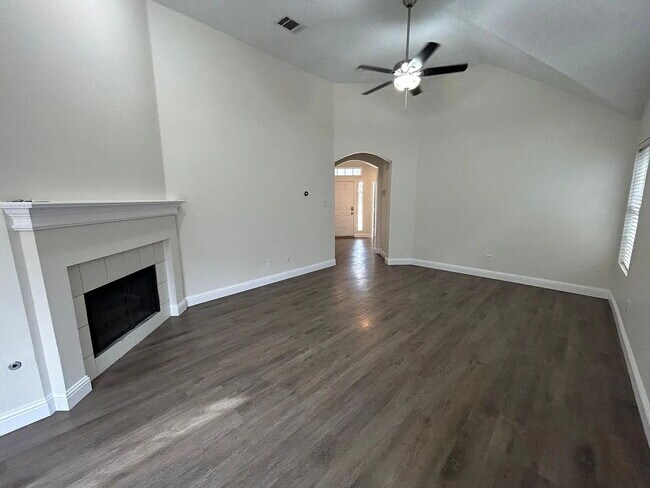 Building Photo - Charming 3-Bedroom Plano Retreat with Cozy Fireplace & Gleaming Hardwood Floors!