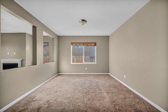 Building Photo - Sun-Filled, Spacious Living with a Three-Car Garage