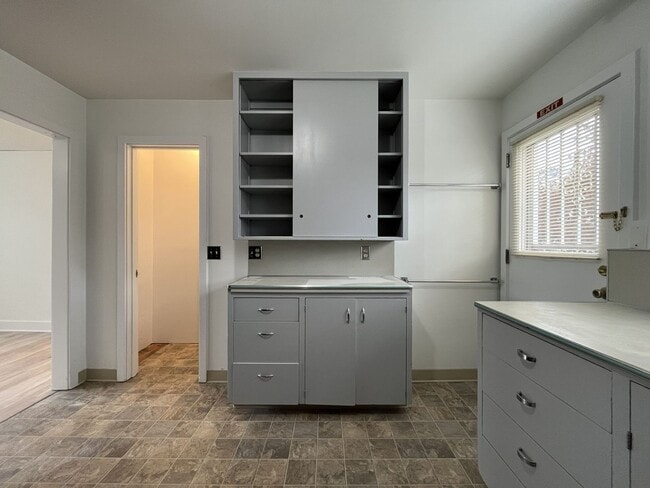 Building Photo - Expansive 4BR 2,900+ Sq Ft Home with Theater-Style Living Room & Bonus Hobby Workshop