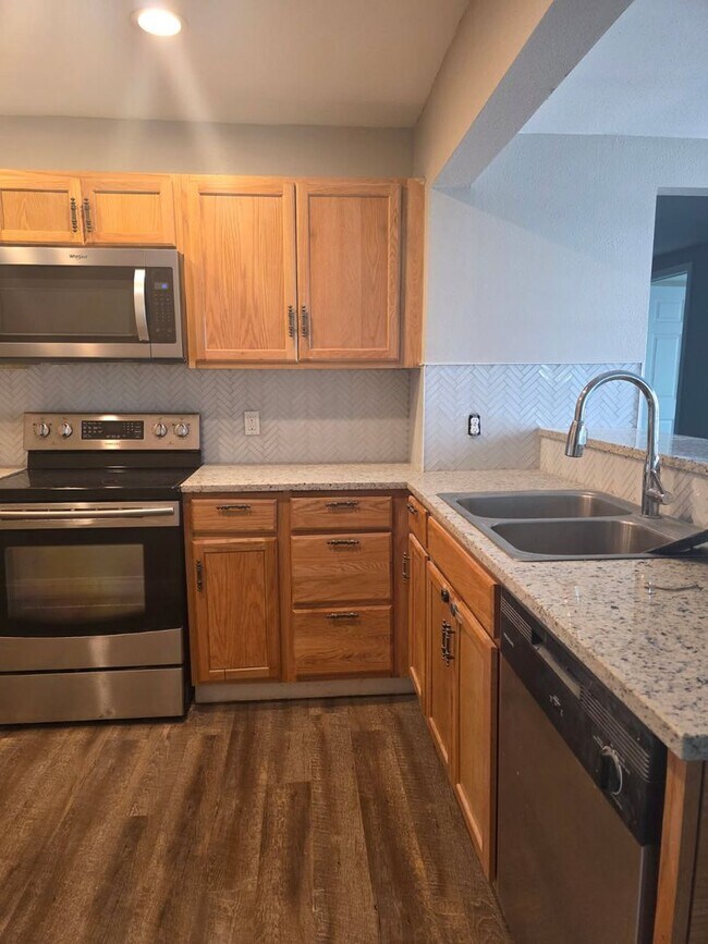 Building Photo - Step into this updated 4-bedroom, 2-bath home ideally situated in the heart of Sand Springs.