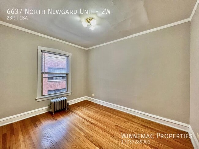 Building Photo - 6637 N Newgard Ave