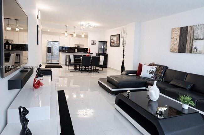 Building Photo - 19380 Collins Ave