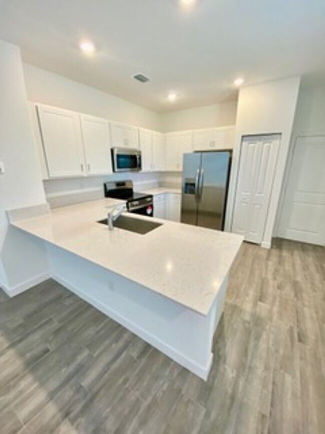 Building Photo - Brand new Townhome centrally located in La...