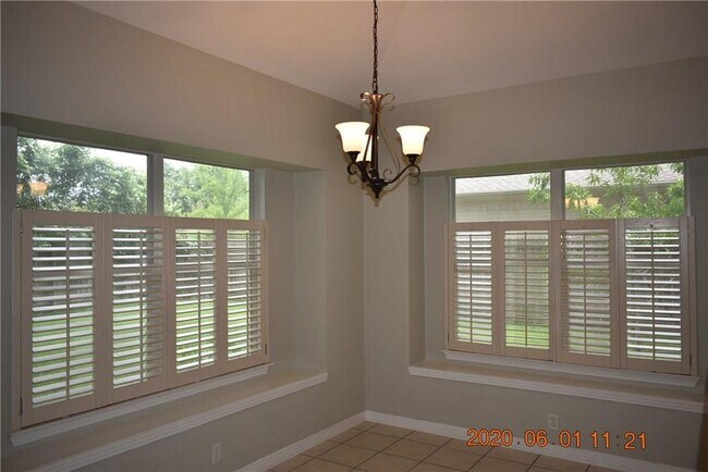 Building Photo - 10016 Liriope Cove