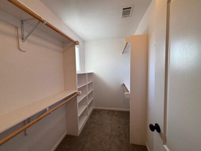 Building Photo - Modern Olathe Beauty with Covered Lanai, Loft & Main-Level Primary Suite