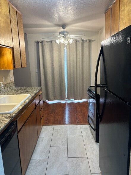 Kitchen and dining rooms - 445 Almond Dr. #29