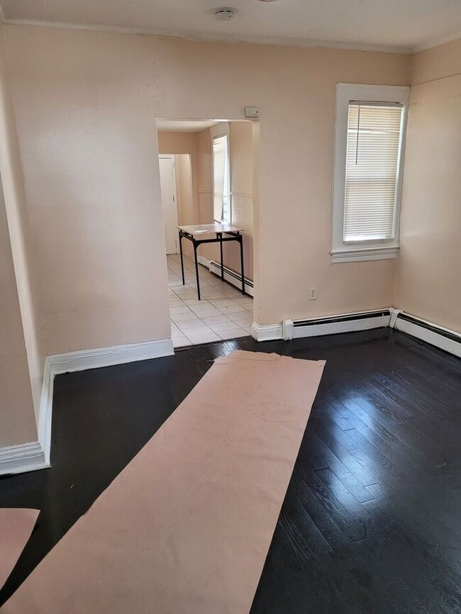 Building Photo - Three-Bedroom Apartment Near Public Transportation