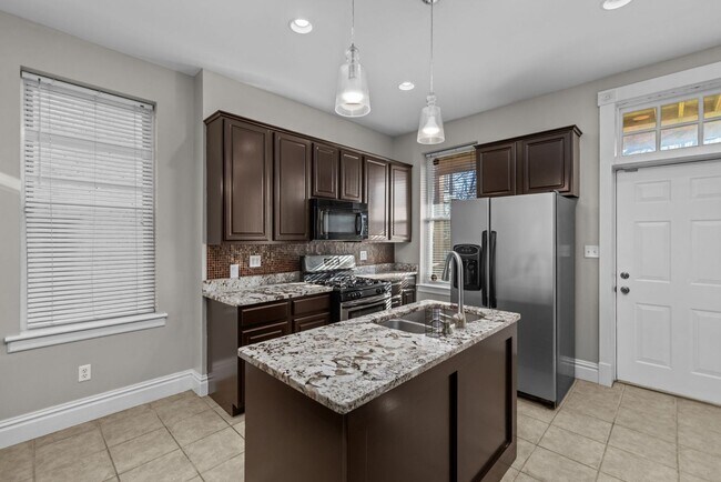 Building Photo - MOVE-IN SPECIAL | Updated 3BR Home in The Grove w/ Finished Basement + Yard